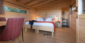 Hotels Les Cabanes Dans Les Bois : photos des chambres