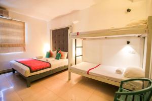 Comfort Quadruple Room with 10% Discount on Laundry room in Clock Inn Dehiwala