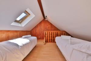 Chalets Le Chalet du Tanet spa sauna terrasse en Alsace : photos des chambres