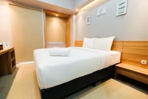 Furnished Studio No Kitchen Apartment Mustika Golf Residence By Travelio
