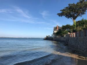 Appartements Neuf et haut de gamme au coeur du Pouliguen boutiques port et plage a pied : photos des chambres