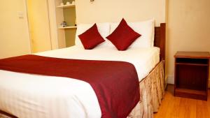 Family Room (2 Adults + 1 Child) room in La Gaffe - Restaurant with Rooms