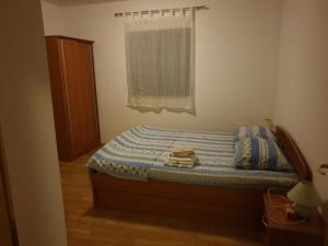 Two-Bedroom Apartment with Balcony and Sea View room in Apartments by the sea Ugljan - 17848