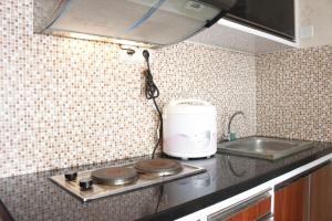 Cozy 2BR Tamansari Panoramic Apartment By Travelio