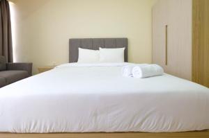 Comfy Studio Room with City View at Menteng Park Apartment By Travelio