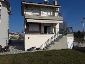 Počitni&scaron;ka hi&scaron;a SEASIDE MAISONETTE Aroy&iacute; Grčija
