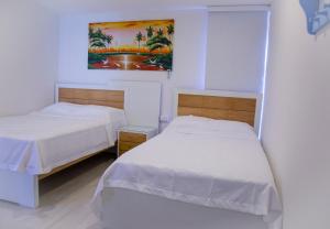 Double Room with Two Double Beds room in Casana Hostal