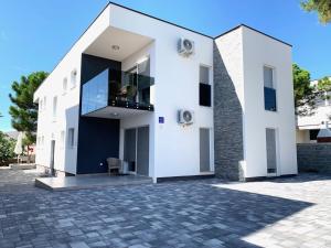 Apartmani Eden Vrsi Mulo - 4hvězdičkové hotely ve městě Vrsi