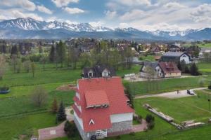 Villa Teddy Deluxe Apartments Zakopane Murzasichle in a quiet neighborhood