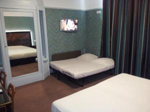 Hotels Le Grand Hotel : photos des chambres