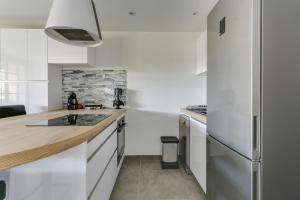 Appartements LE HAMEAU DES PINS : photos des chambres