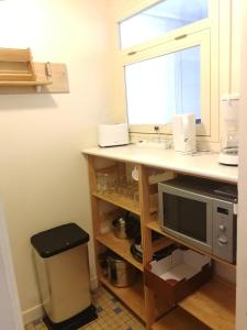 Appartements Studio Residence le Metropole : photos des chambres
