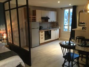 Appartements La Maison de Jeanne : Studio Lit King-Size