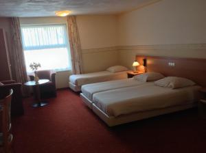 Comfort Triple Room room in SuyderSee Hotel