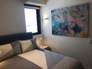 Laurent Balcony Views Steps from Laneway Vibes