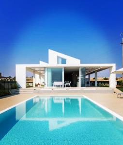 Villa Arillà con piscina e padel