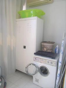 Pefkohori apart. near the beach with indor parking and yard