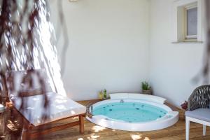 Doppelzimmer mit Whirlpool-Badewanne