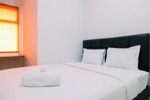 Nice 2BR at Springlake Summarecon Bekasi Apartment By Travelio