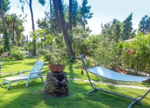 Villa Aurora in Sani with garden and pool