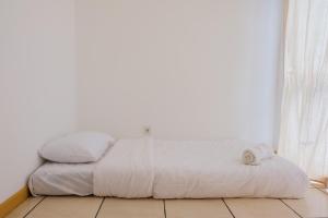 Comfortable 2BR Apartment Serpong M-Town Residence By Travelio