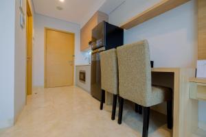 Spacious Studio Room at Capitol Suites Apartment By Travelio