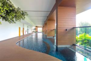 Spacious Studio Room at Capitol Suites Apartment By Travelio