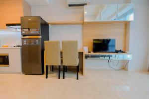 Spacious Studio Room at Capitol Suites Apartment By Travelio