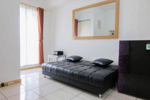 Comfortable 2BR Apartment at M-Town Residence By Travelio