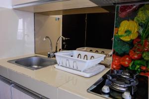 Best Price Studio Apartment at Atria Residence near Mall By Travelio