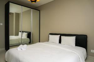 Highest Value 1BR Apartment at Ciputra International By Travelio