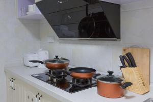 Sen’s Mansion Locals Apt00156210,Close to gangding subway station & modern department store & jinan university & zhengjia squ, Apartmanok Kuangcsou - big - 22