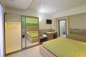 Chambre Familiale (2 Adultes + 1 Enfant)