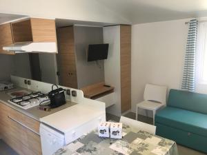 Complexes hoteliers Camping La Pinede : photos des chambres