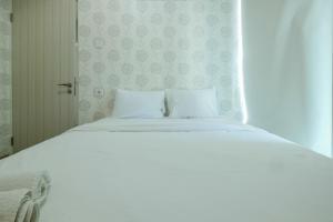 Comfy and Modern 2BR Grand Kamala Lagoon Apartment By Travelio