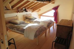 Appartements Les Chalets du Chaberton, Pied de pistes et Spa : photos des chambres