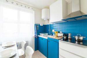 Appartements Le Studio Bleu de la gare : photos des chambres