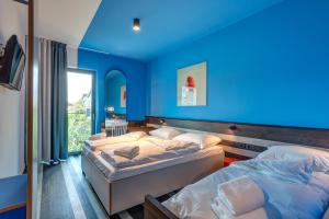Triple Room room in MEININGER Hotel Bruxelles Gare du Midi