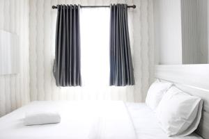 Modern 2BR Apartment at Mekarwangi Square Cibaduyut By Travelio