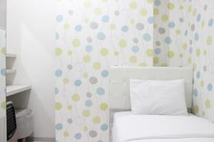 Modern 2BR Apartment at Mekarwangi Square Cibaduyut By Travelio