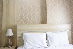 Classic 2BR Apartment at Mekarwangi Square Cibaduyut By Travelio