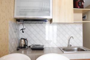 Classic 2BR Apartment at Mekarwangi Square Cibaduyut By Travelio