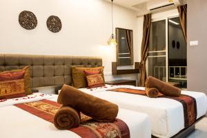 Twin Room with Garden View room in Pongsakorn Boutique Resort