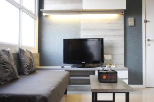 Quiet 2BR Apartment @ Parahyangan Residence Apartement with Mountain View By Travelio