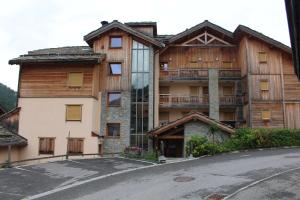 Appartements Les Chalets du Chaberton, Pied de pistes et Spa : photos des chambres