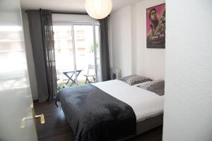 Appartements du Leman - Proches Geneve - Parkings prives gratuits : photos des chambres