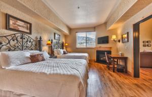 Steps to skiing, resort property, mountain views, shared hot tub, sauna, steam room 223C