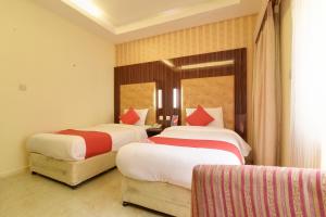 Standard Twin Room room in OYO 273 Burj Nahar Hotel