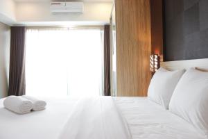 Deluxe Studio Room @ Tamansari La Grande Apartment By Travelio