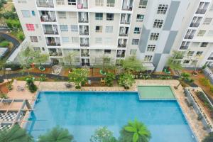 Brand New Cozy Studio at Scientia Apartment By Travelio